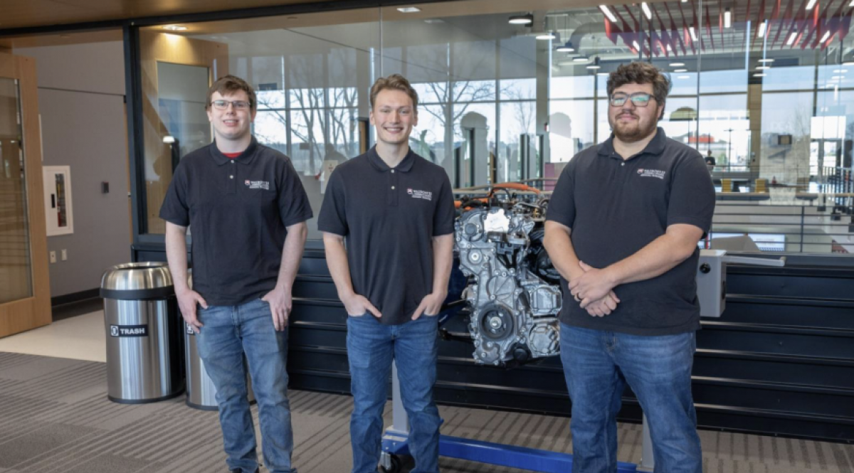 (L to R) Waubonsee Automotive Service Technology students Jadon Johanes, Jacob Merrill, and Matthew Meadows at TEC signing