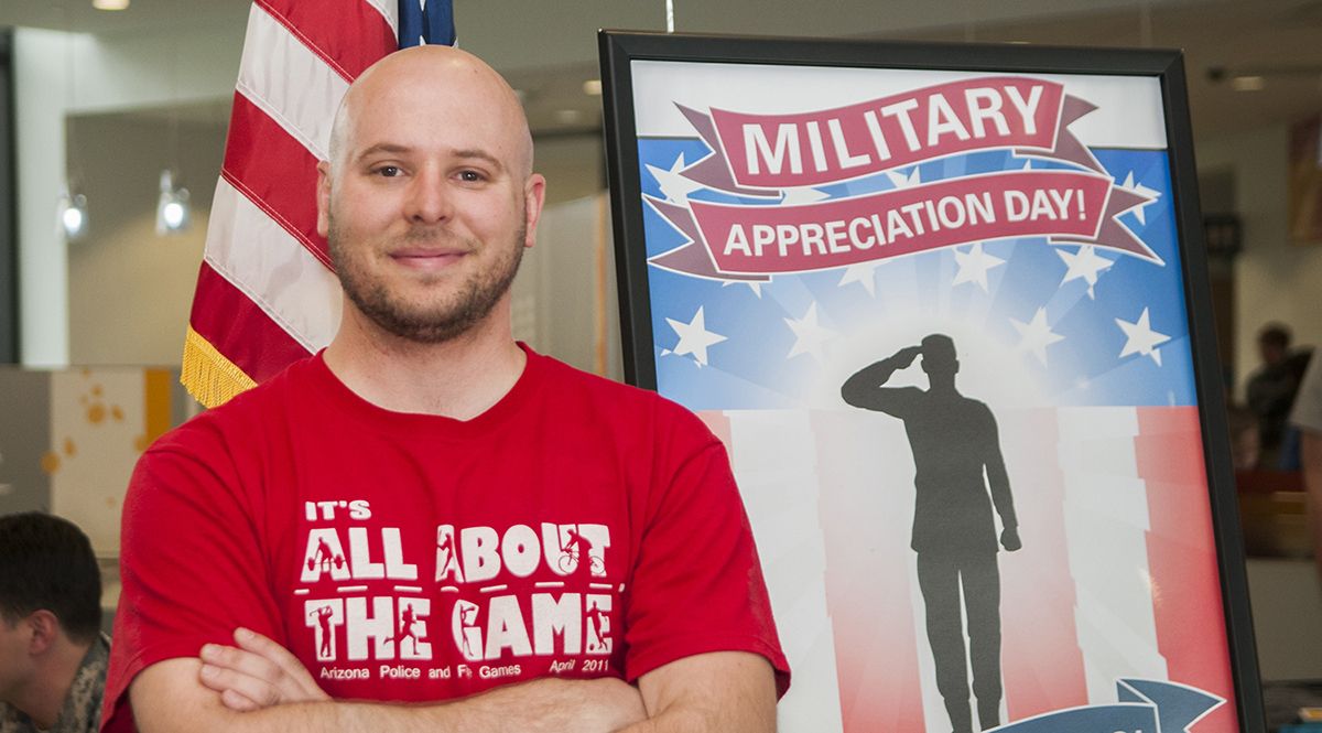 Veterans Day with Student Near Poster 2014