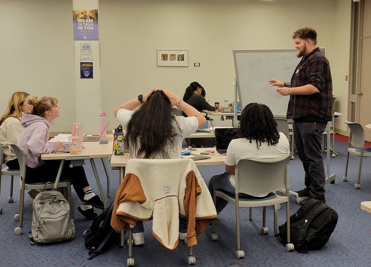 Tutoring Center classroom with students and tutor preparing for test
