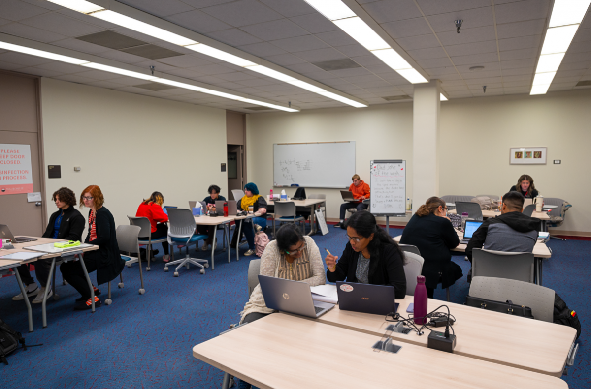 Tutors helping students in the Tutoring Center