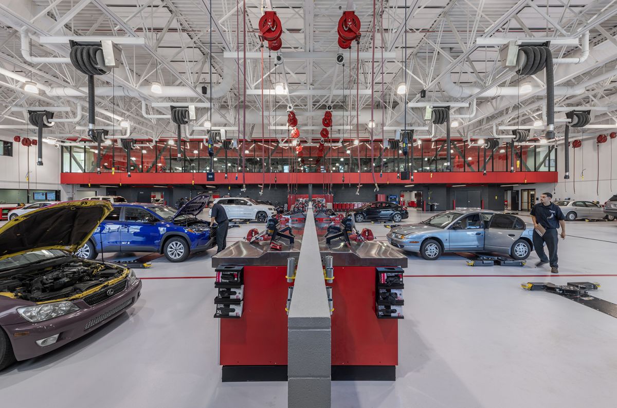 Students working on cars in the Technical Education Center Auto Lab