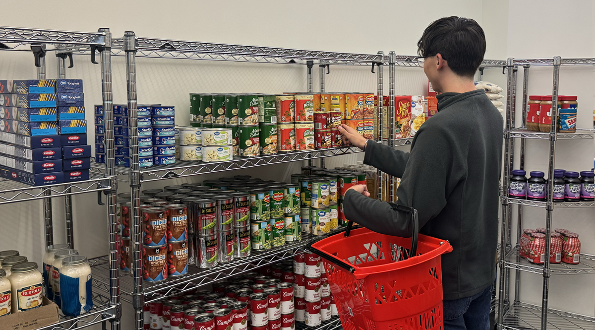 Student browsing for food in pantry