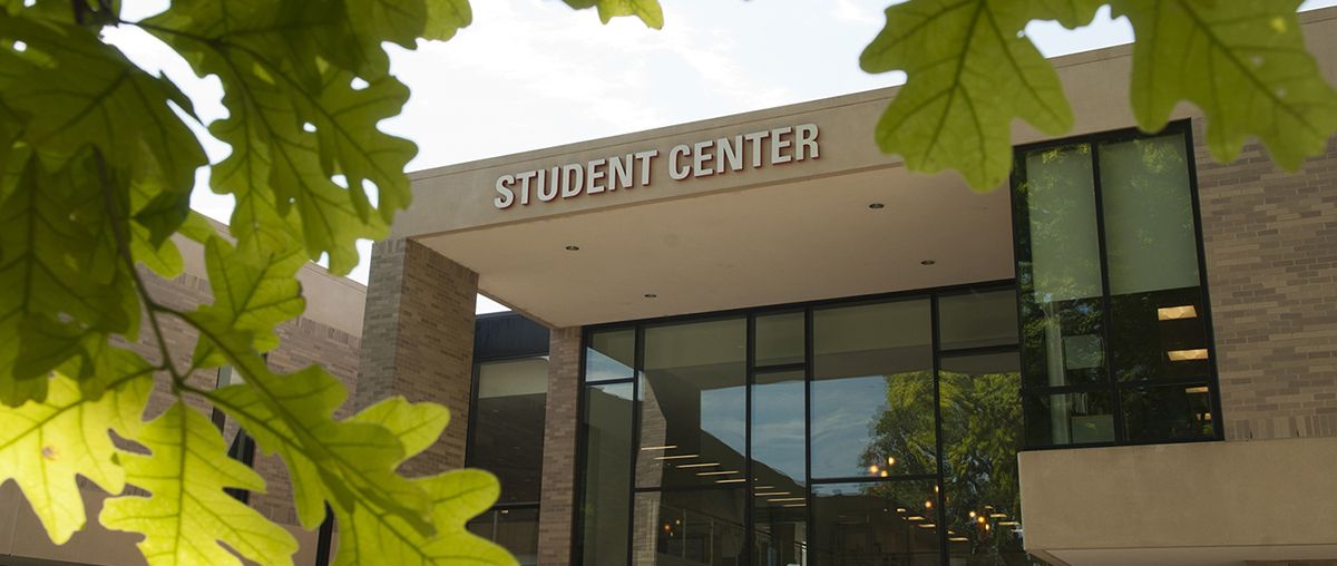 Student center outside Sugar Grove during summer
