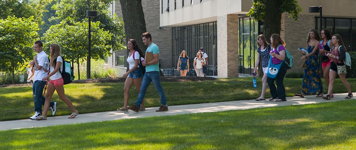 Students walking outside STC summer S