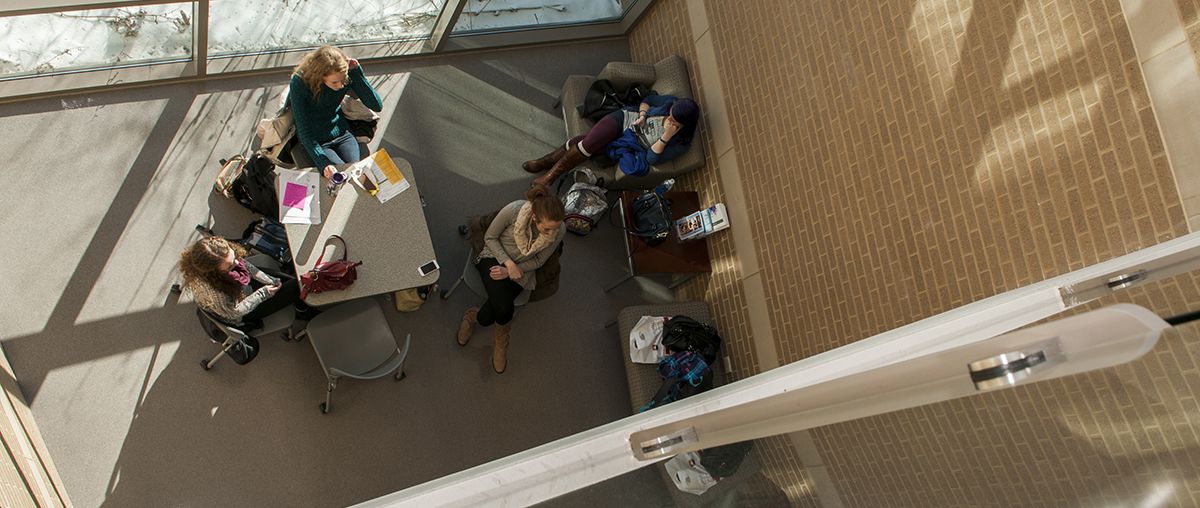 Students sitting at table aerial view L