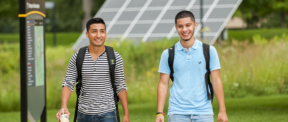 Students near Solar panel at SG