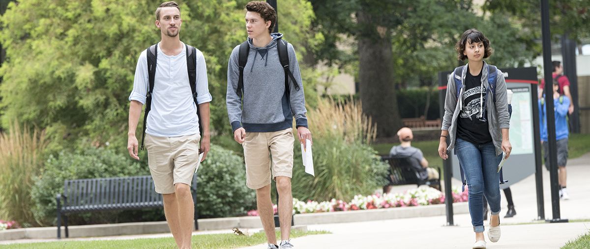 Students walking outside summer L