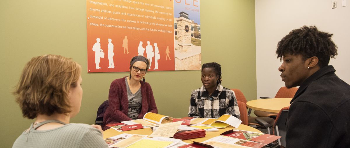 Admissions staff helping students