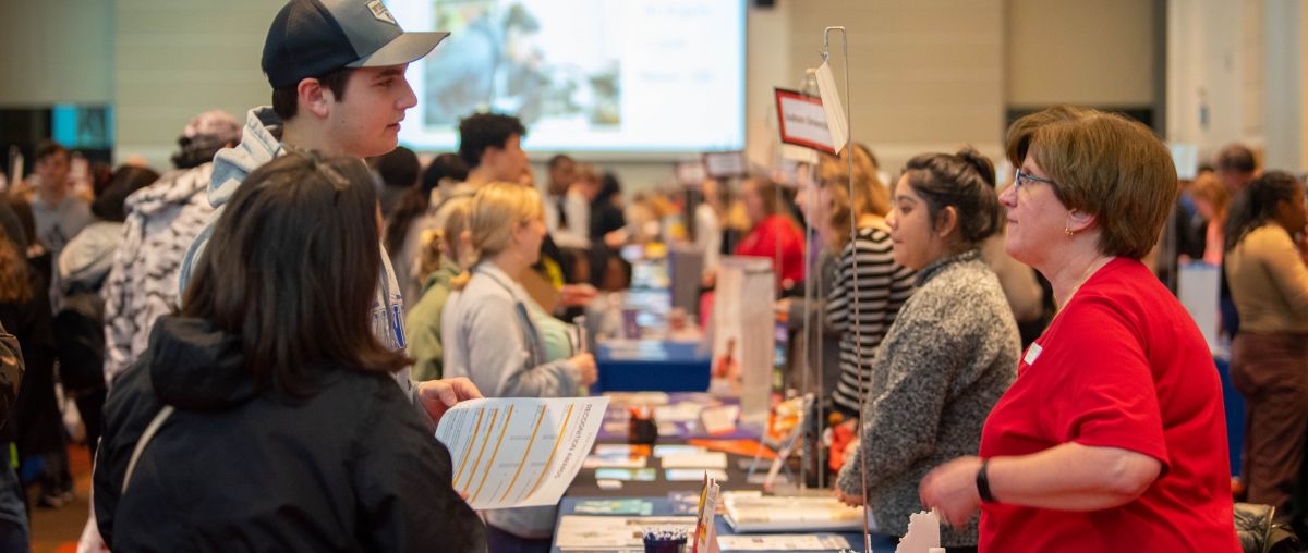 students meeting with college reps