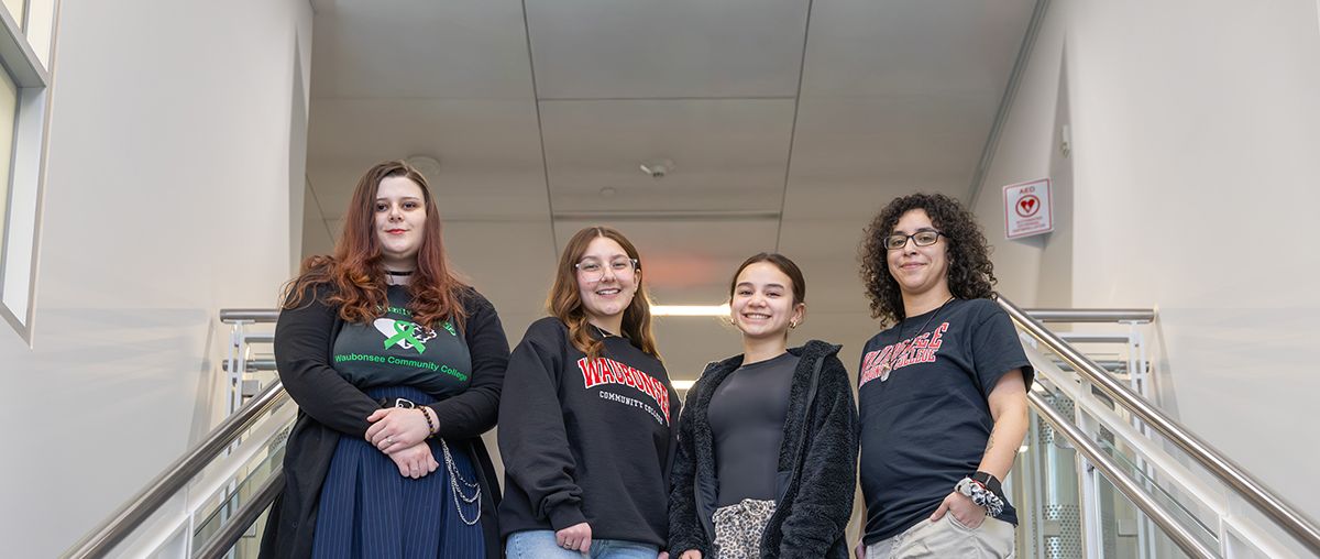 Peer Support Group students posing on stairs 