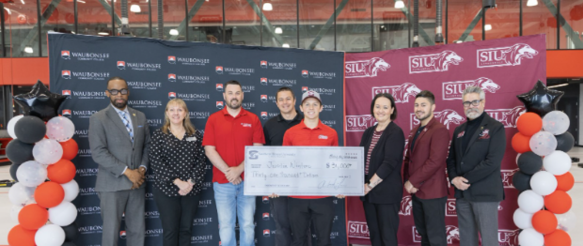 Pictured (left to right): Clayton Muhammad, Vice President of Community Engagement and External Affairs; Sarah Kocunik, Graduation and Transfer Coordinator; Tyler Friedland, Assistant Professor of Automotive Technology; Guy Tiberio, Associate Professor of Automotive Technology; Justin Winters; Agnes Szemborski, Assistant Vice Chancellor for External Relations; Sergio Vlahovic, Student Success Coach; and Rey Diaz, Transfer Admissions Representative 