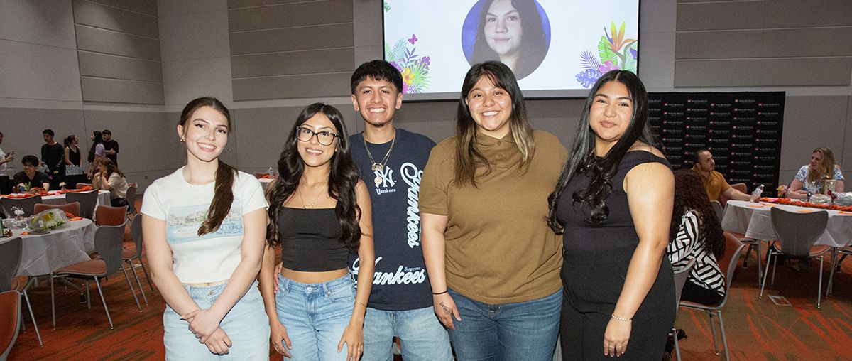 Group of students, smiling at camers