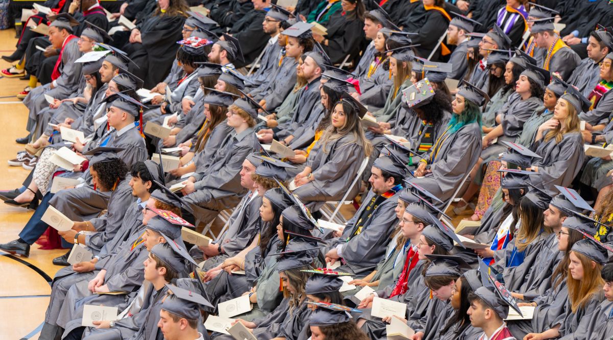 Crowd of graduates at commencement ceremony