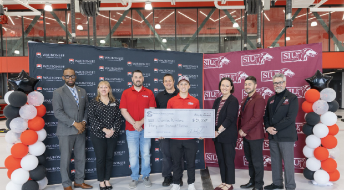 Pictured (left to right): Clayton Muhammad, Vice President of Community Engagement and External Affairs; Sarah Kocunik, Graduation and Transfer Coordinator; Tyler Friedland, Assistant Professor of Automotive Technology; Guy Tiberio, Associate Professor of Automotive Technology; Justin Winters; Agnes Szemborski, Assistant Vice Chancellor for External Relations; Sergio Vlahovic, Student Success Coach; and Rey Diaz, Transfer Admissions Representative 
