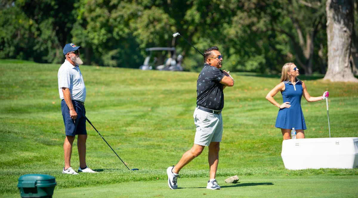 Home Hero Golf Outing three golfers