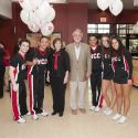 Dr. Sobek, former City of Aurora Mayor Tom Weisner, and Waubonsee cheerleaders at the 2011 Open House for the new Aurora Downtown Campus.