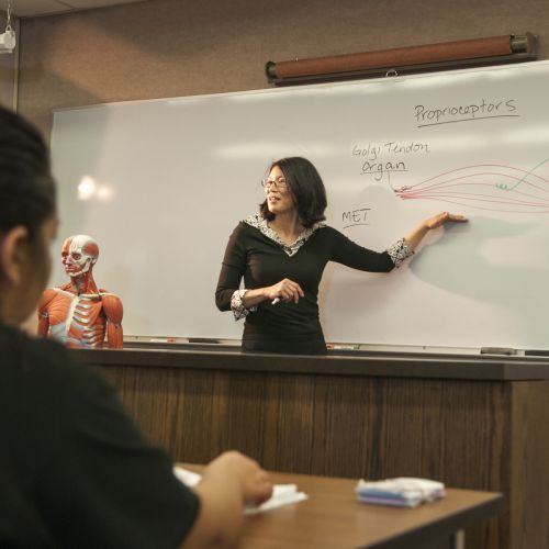 Therapeutic massage faculty in class