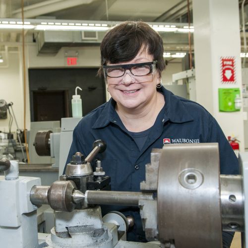 Student in CNC lab