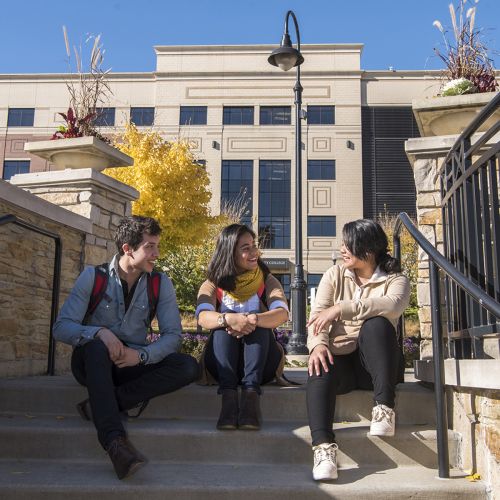 Students sitting outside the Student Center at Sugar Grove