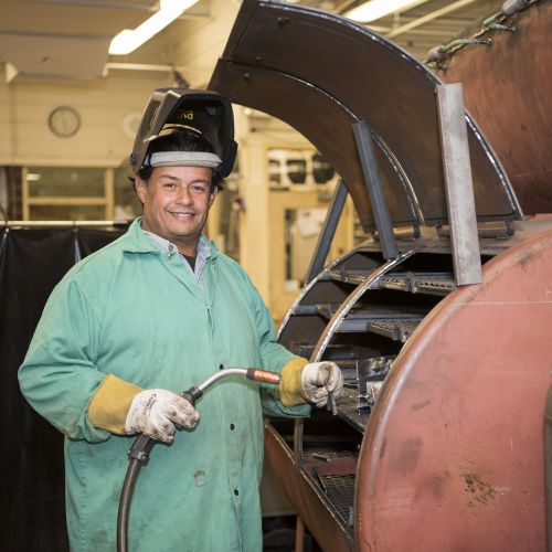 Student working in Welding Classroom