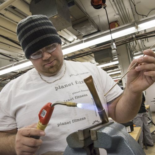 Student working in HVAC lab