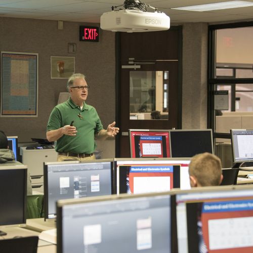 Instructor teaching in CAD lab S
