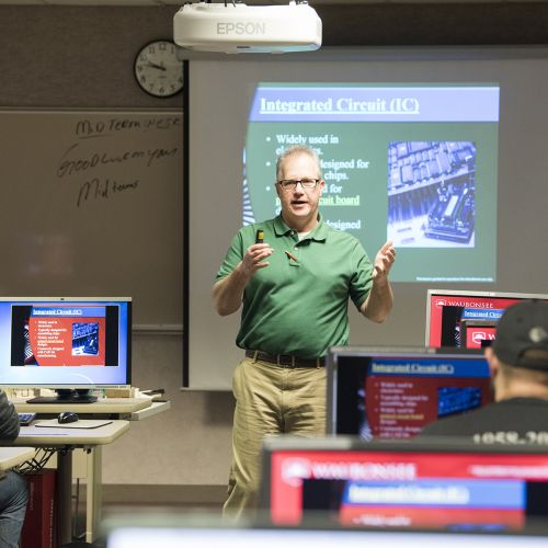 Instructor teaching in CAD lab L