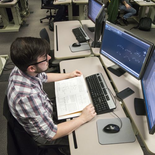 Student on computer in CAD lab S