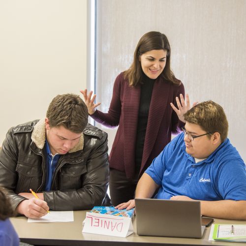 Communications faculty Vicky Archos instructs students. 