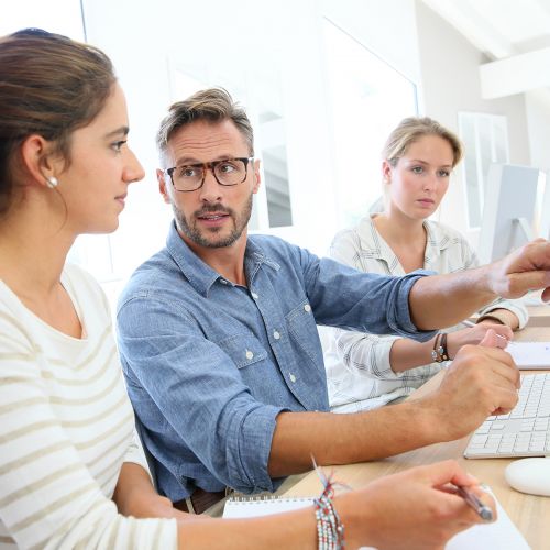 people infront of computer S