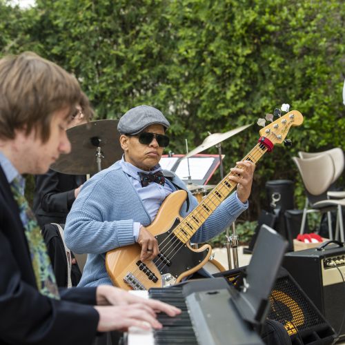 man playing bass guitar