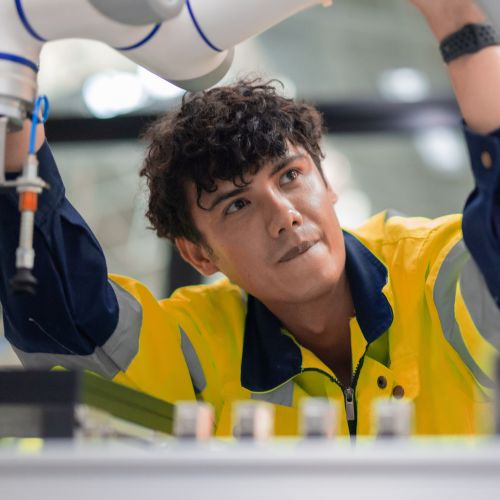 Industrial Maintenance Student working on machine