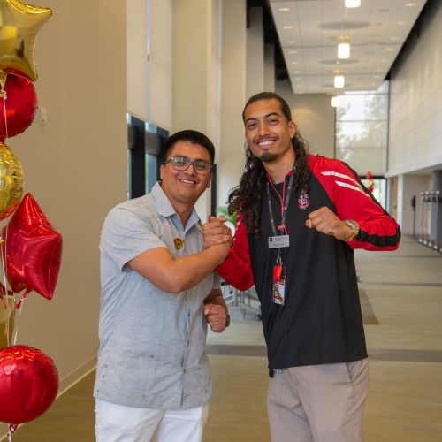 Franklin Ortega-Palaguachi and guest speaker posing together
