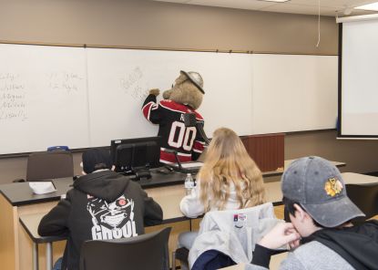 Rusty in a classroom
