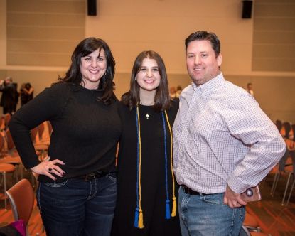 Photo of Devin Couturier with parents