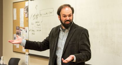 Dr. Aaron Lawler teach Humanities Class