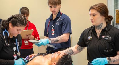EMT students working on patient