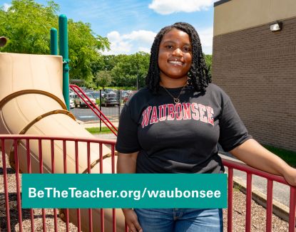 Woman of color by playground