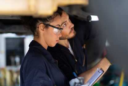 Two industrial maintenance workers