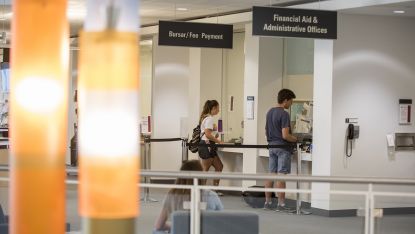 Students at Bursar and Financial Aid Windows L