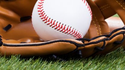 photo of baseball and mitt