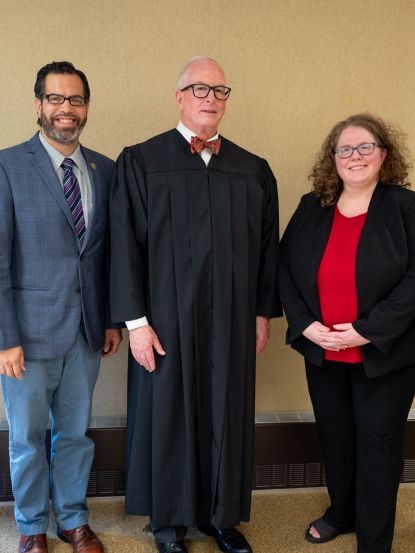 Waubonsee President Dr. Brian Knetl stands with newly re-elected Board members Rick Guzman, Tina Willson, and Daniel Jaquez, along with The Honorable Robert P. Pilmer, Circuit Judge for the 23rd Judicial Court.