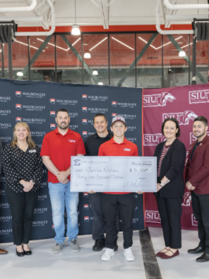 Pictured (left to right): Clayton Muhammad, Vice President of Community Engagement and External Affairs; Sarah Kocunik, Graduation and Transfer Coordinator; Tyler Friedland, Assistant Professor of Automotive Technology; Guy Tiberio, Associate Professor of Automotive Technology; Justin Winters; Agnes Szemborski, Assistant Vice Chancellor for External Relations; Sergio Vlahovic, Student Success Coach; and Rey Diaz, Transfer Admissions Representative 