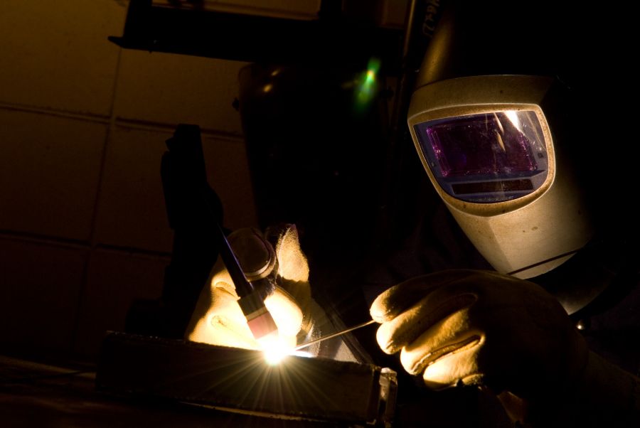 Waubonsee welding student welding metal