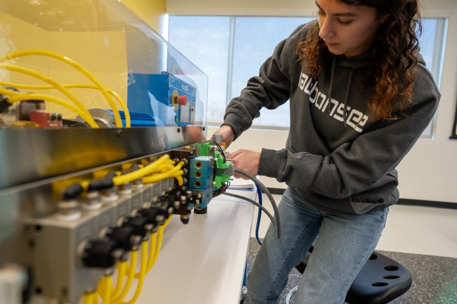 Industrial Maintenance Student working on simulator