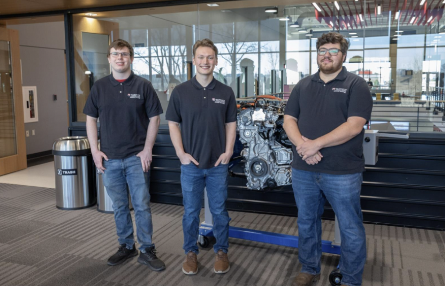 (L to R) Waubonsee Automotive Service Technology students Jadon Johanes, Jacob Merrill, and Matthew Meadows at TEC signing