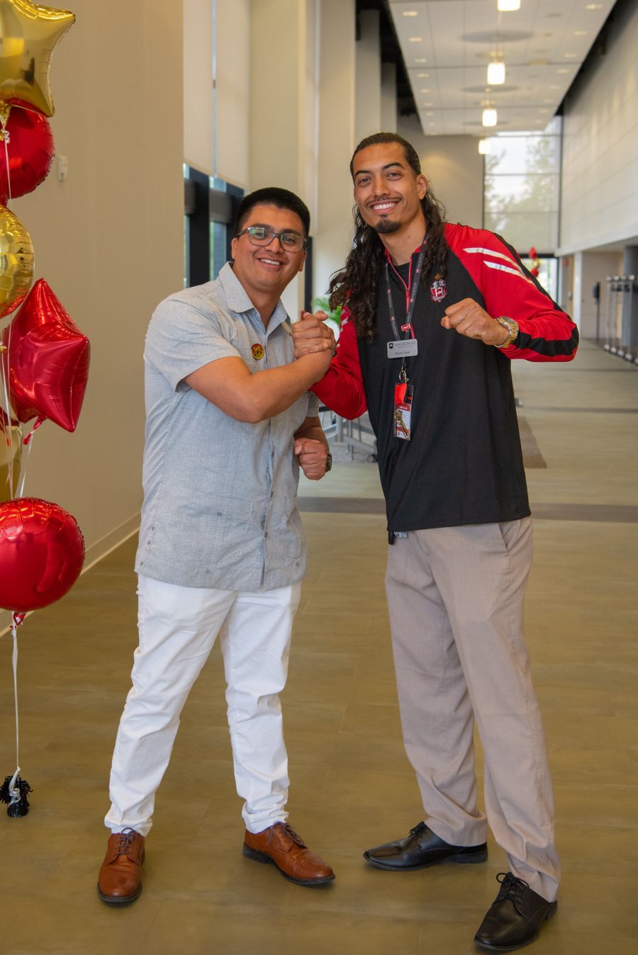 Franklin Ortega-Palaguachi and guest speaker posing together