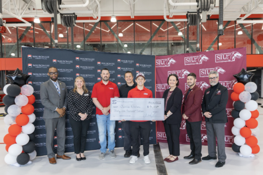 Pictured (left to right): Clayton Muhammad, Vice President of Community Engagement and External Affairs; Sarah Kocunik, Graduation and Transfer Coordinator; Tyler Friedland, Assistant Professor of Automotive Technology; Guy Tiberio, Associate Professor of Automotive Technology; Justin Winters; Agnes Szemborski, Assistant Vice Chancellor for External Relations; Sergio Vlahovic, Student Success Coach; and Rey Diaz, Transfer Admissions Representative 