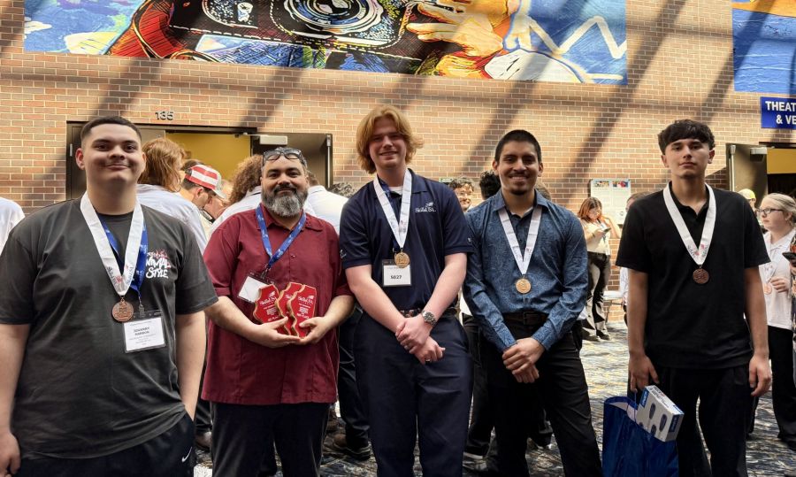 Waubonsee students Jovanny Marron, Ben Swanson, Alex Soto, and Javier Solis join Instructor Ramiro Cervantes (second from left) at the SkillsUSA Illinois State Championships.